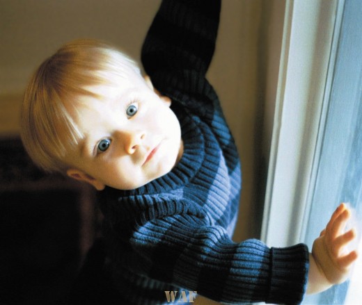 David, leaning on a window