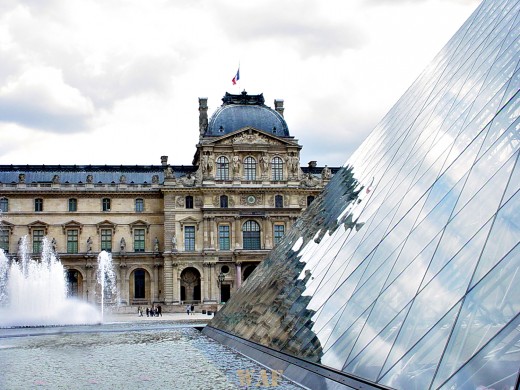 the Pyramid and a fountain, with the Louvre (Paris)