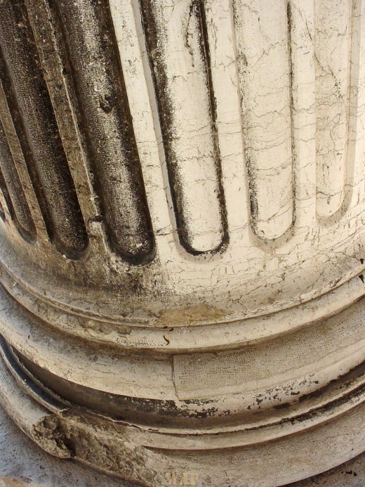 a close-up of a column in Venice (Italy)